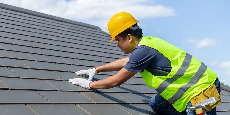 A professional conducting a roof inspection to ensure long-term roof integrity.