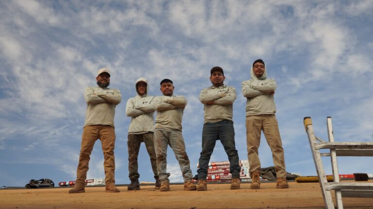 Arizona Roofers crew on a finished roof